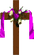 a wooden cross with flowers blooming on it