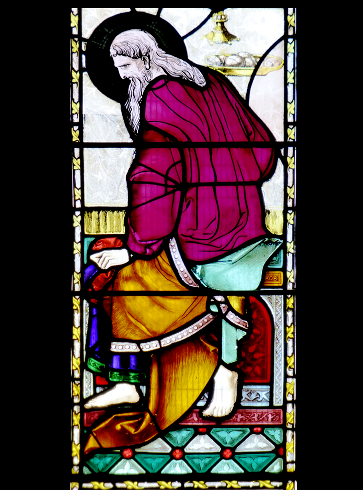 a stained glass window depicting Judas Iscariot